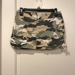 Camouflage mini skirt.